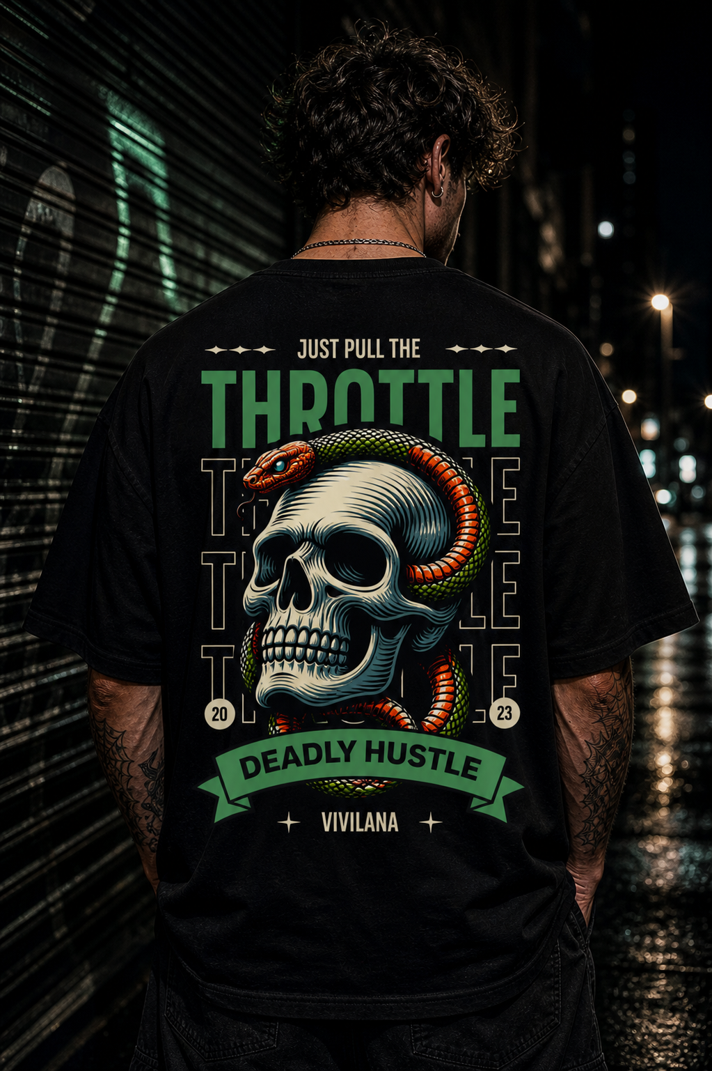 Men's black graphic tee with skull, snake, and 'Just Pull The Throttle' text, urban night backdrop