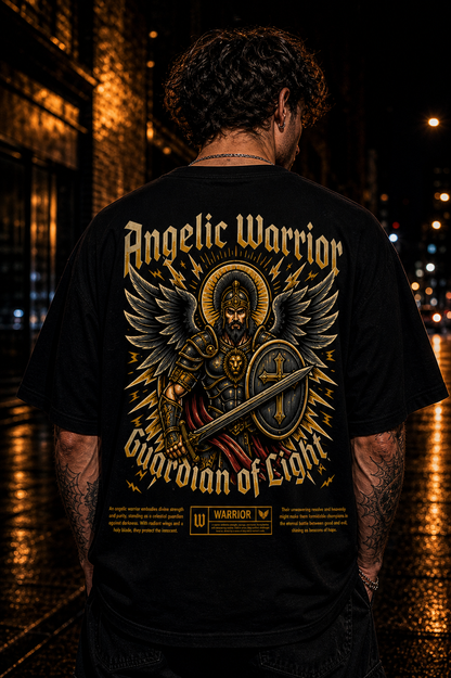 Man wearing black 'Angelic Warrior Guardian of Light' T-shirt with winged knight design on city street at night.